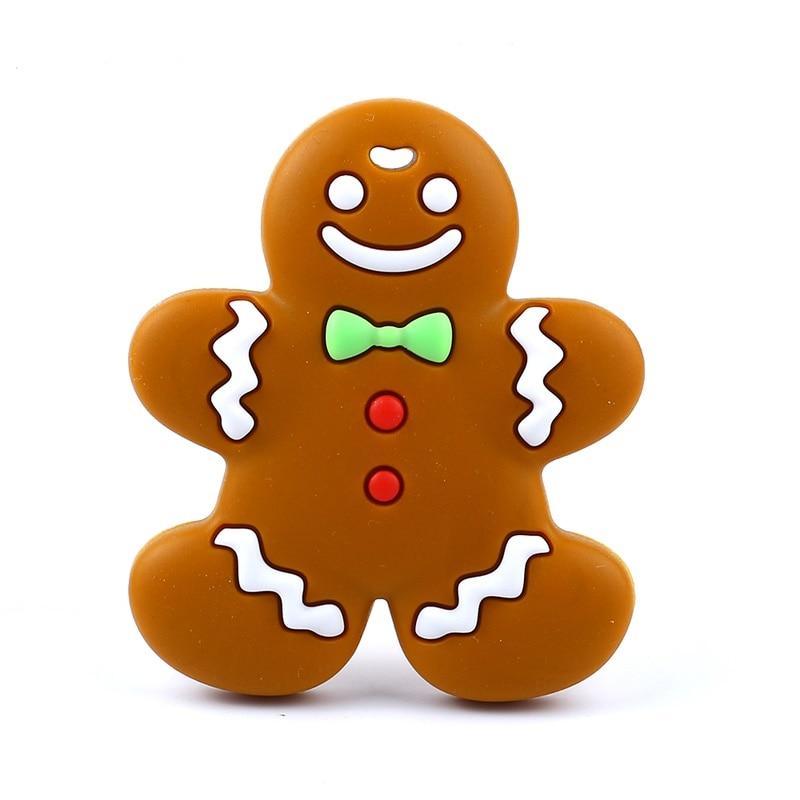 Stevvex silicone baby teether gingerbread man with green bow tie and white icing on Tampa Home & Garden Store