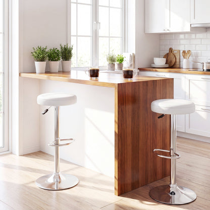 DirectDeals swivel bar stools with footrests, white cushioned seats on chrome pedestals on Tampa Home & Garden Store