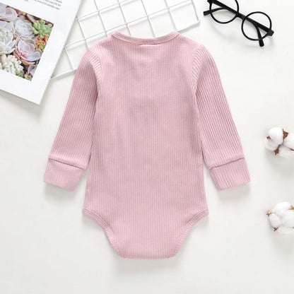Pink ribbed long-sleeve baby one-piece bodysuit romper on Tampa Home & Garden Store