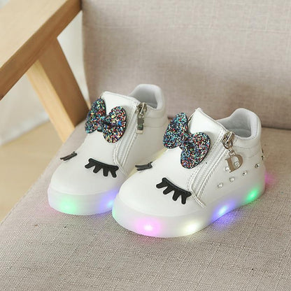 White LED toddler sneakers by Stevvex with glitter bow, eyelash accents, side zipper on Tampa Home & Garden Store