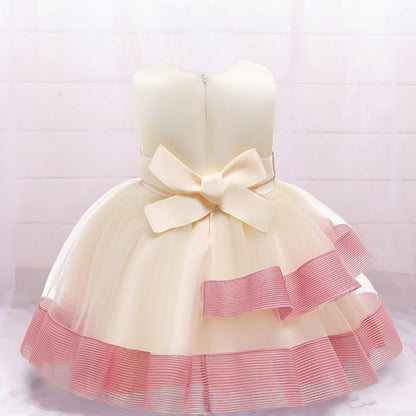 Stevvex baby girl party dress ivory bodice with pink striped puffy tulle layers and big bow on Tampa Home & Garden Store