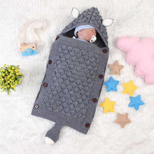 Stevvex knitted baby swaddle blanket gray with hooded ears and buttoned sides, baby sleeping on Tampa Home & Garden Store