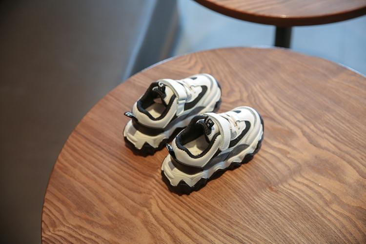 Casual breathable kids sport shoes pair white mesh canvas sneakers with black accents on Tampa Home & Garden Store