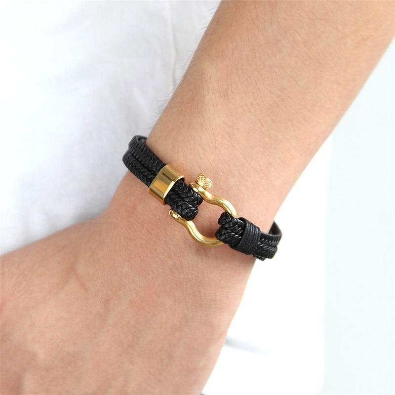Leather bracelet Stevvex with gold anchor clasp on black braided strap, jewelry on Tampa Home & Garden Store