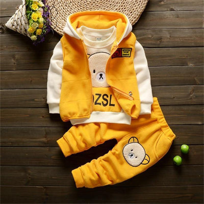 Stevvex baby three-piece winter outfit: yellow hooded vest, white top, yellow pants with bear print on Tampa Home & Garden Store