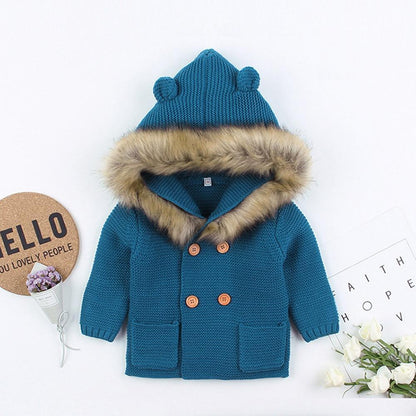 Newborn knit hooded coat Stevvex in teal with faux fur trim and orange buttons, double-breasted on Tampa Home & Garden Store