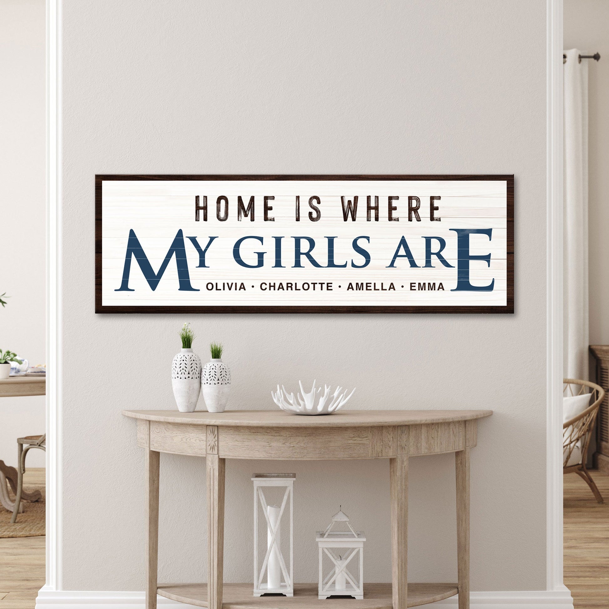 Tailored Canvases canvas sign Home Is Where My Girls Are in blue lettering with brown frame on Tampa Home & Garden Store