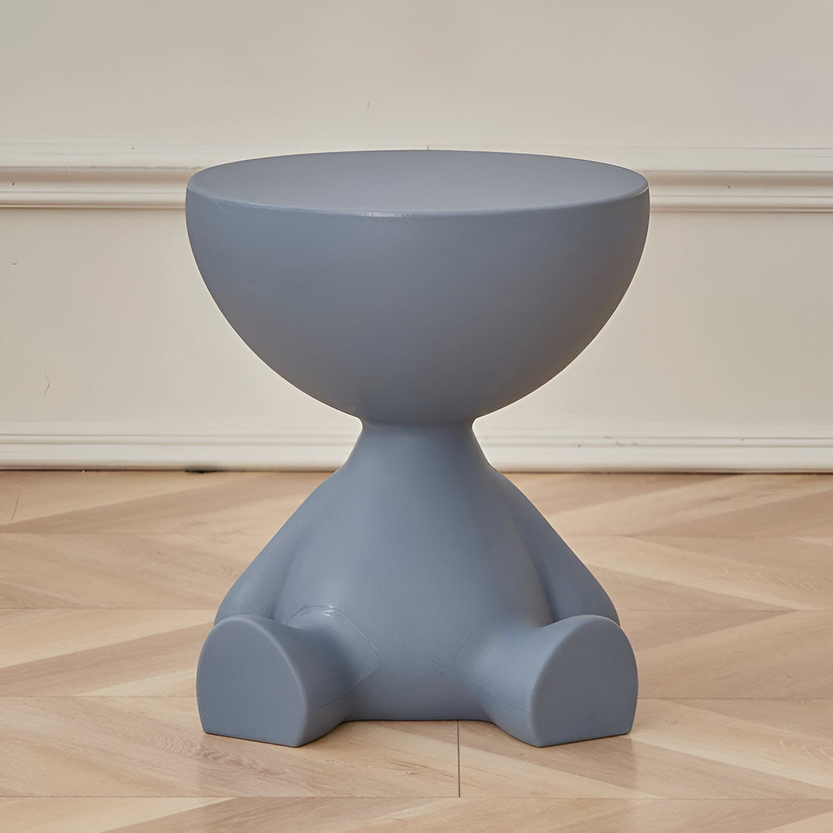 Round blue-gray Moktan Sabai coffee table with a sculptural pedestal base on Tampa Home & Garden Store