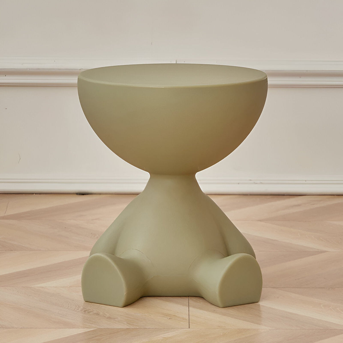 Round coffee table in sage green resin with curved pedestal base Moktan Sabai on Tampa Home & Garden Store