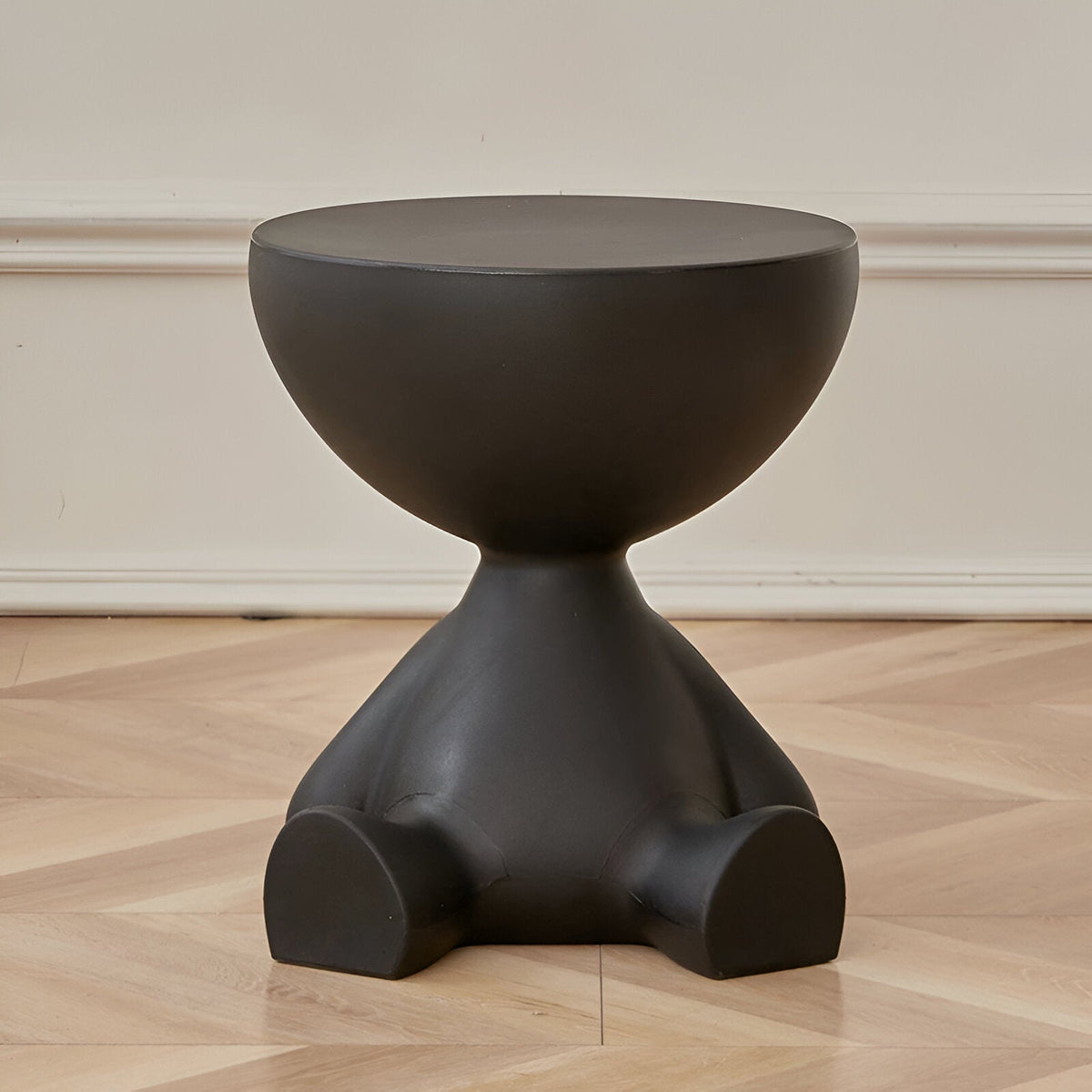 Round black coffee table with matte finish and pedestal base Moktan Sabai on Tampa Home & Garden Store