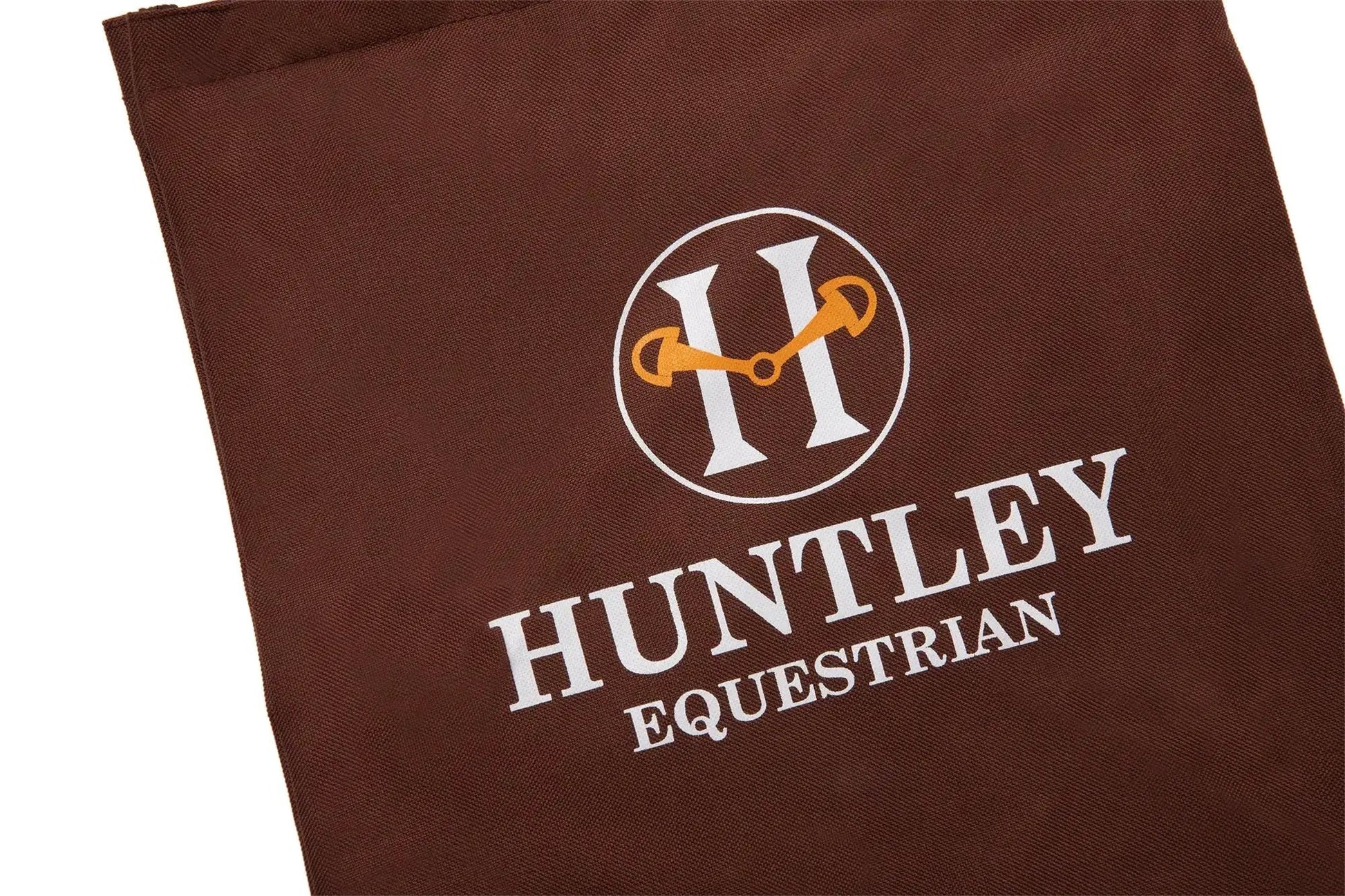 Huntley Equestrian Classic Tote Bag in brown canvas with white logo and orange bridle graphic on Tampa Home & Garden Store
