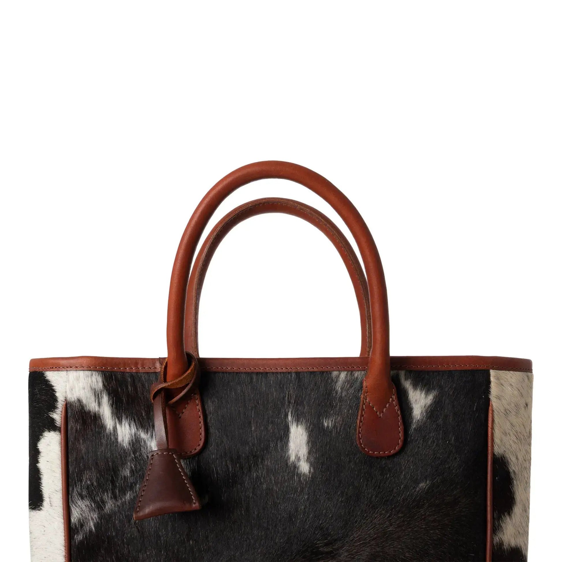 Huntley Equestrian hair-on-hide cow leather tote with brown handles and cowhide pattern on Tampa Home & Garden Store