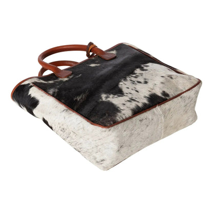 Huntley Equestrian hair-on-hide cowhide tote with brown leather trim and handles on Tampa Home & Garden Store