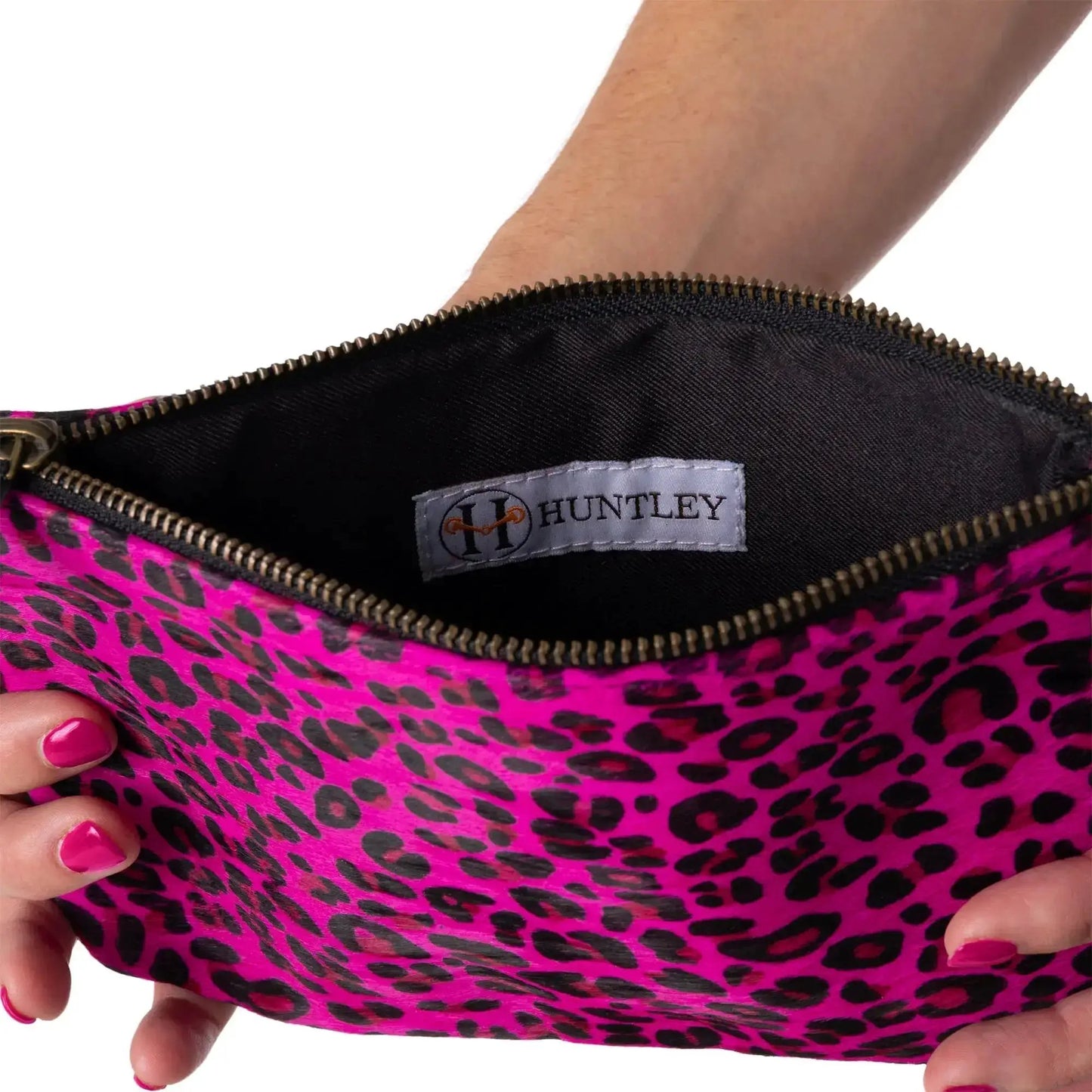Hair-on-hide wristlet clutch by Huntley Equestrian pink leopard with gold zipper on Tampa Home & Garden Store