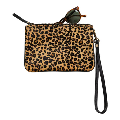 Huntley Equestrian leopard print hair-on-hide wristlet clutch with black strap and sunglasses on Tampa Home & Garden Store