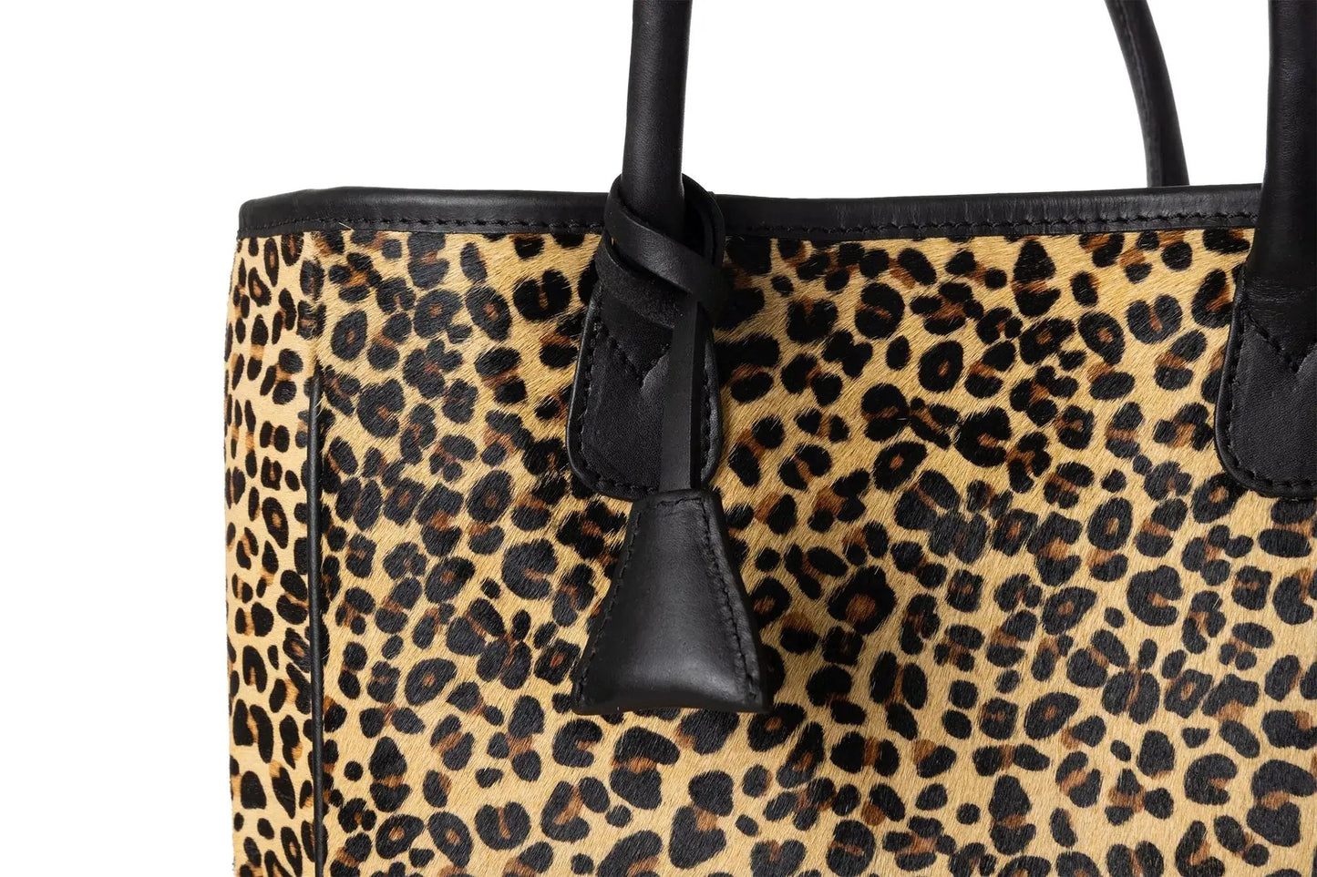 Huntley Equestrian leopard hair-on-hide tote handbag with black leather trim and top handles on Tampa Home & Garden Store