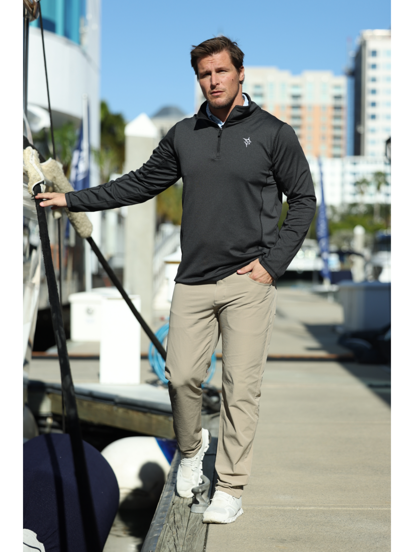 Seaport Pants beige khaki casual men's pants worn by a man at a marina on Tampa Home & Garden Store