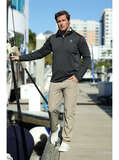 Seaport Pants beige khaki casual men's pants worn by a man at a marina on Tampa Home & Garden Store