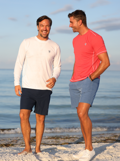 Grander Short Sleeve Performance Tee two White Water Life tees in white and coral at the beach on Tampa Home & Garden Store