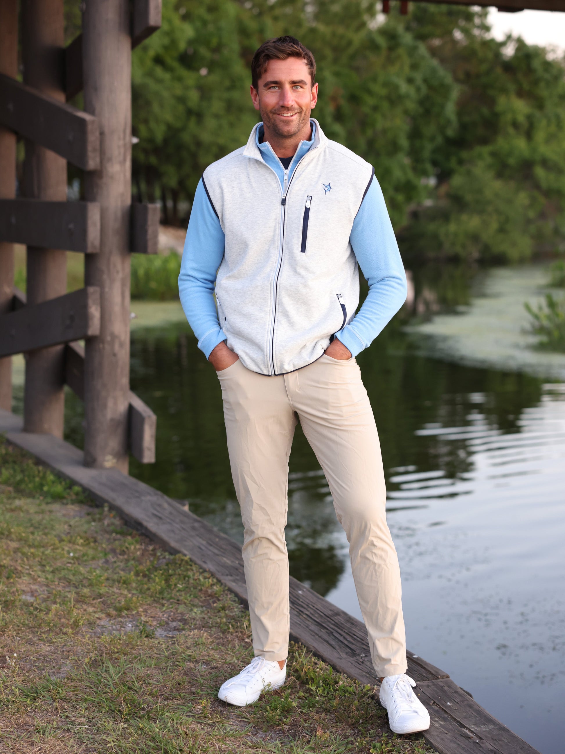 Seaport Pants by White Water Life, beige lightweight casual pants worn by man beside a lake on Tampa Home & Garden Store