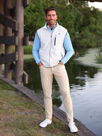 Seaport Pants by White Water Life, beige lightweight casual pants worn by man beside a lake on Tampa Home & Garden Store