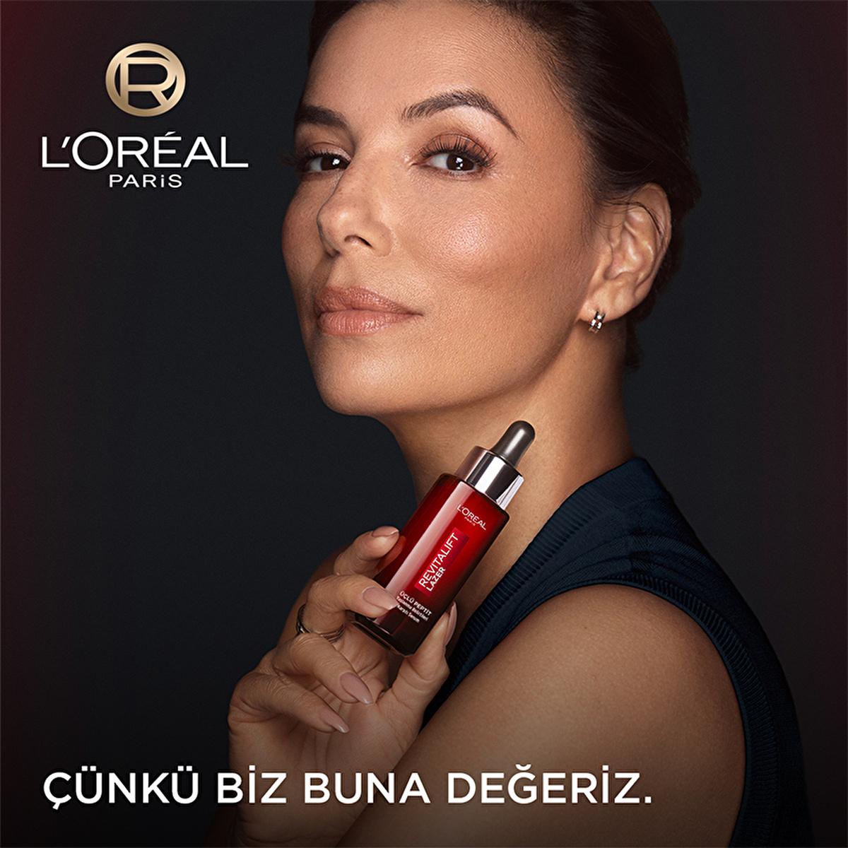 Revitalift face serum bottle red glass with dropper by L’Oréal Paris on Tampa Home & Garden Store