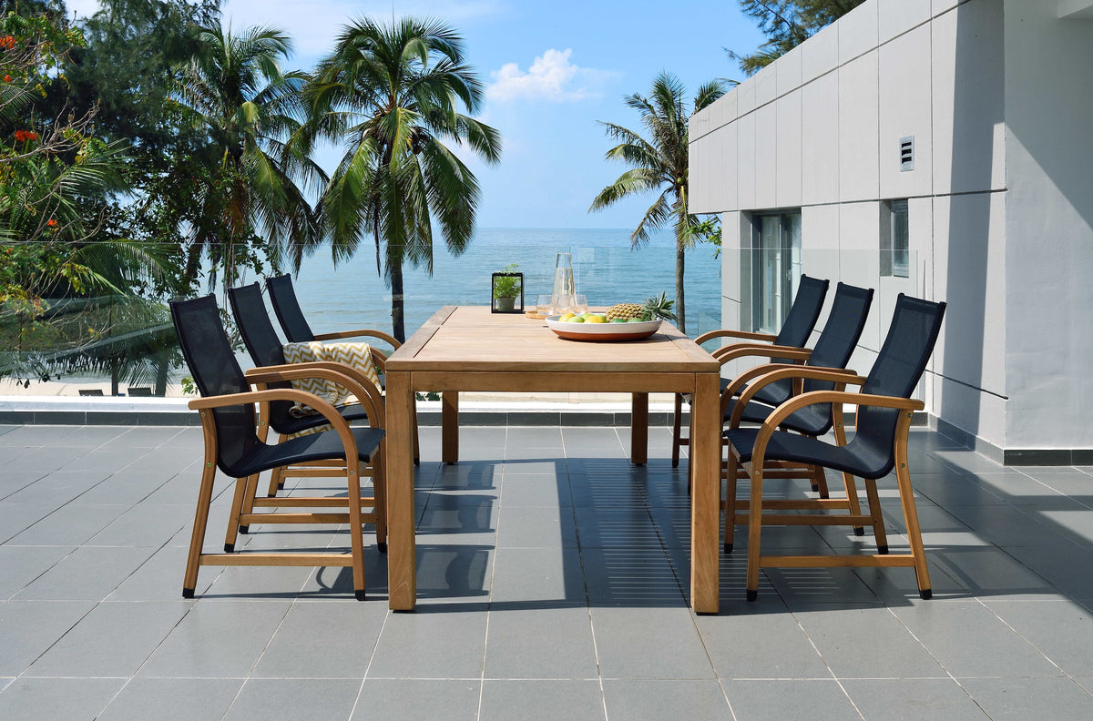 Rinjani rectangular outdoor dining table with six Manhattan black armchairs, patio set on Tampa Home & Garden Store