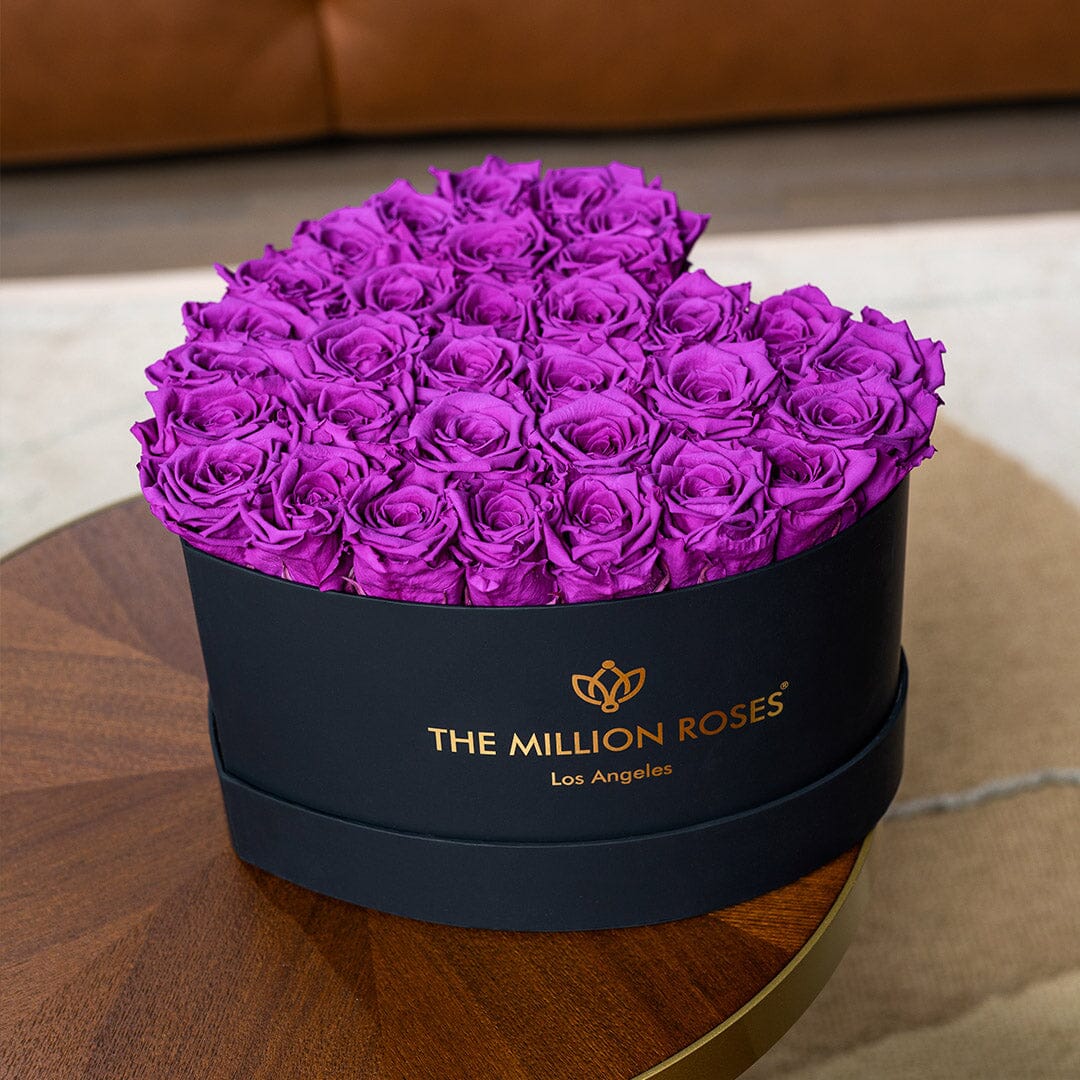 Heart black box filled with bright purple roses by The Million Roses on Tampa Home & Garden Store