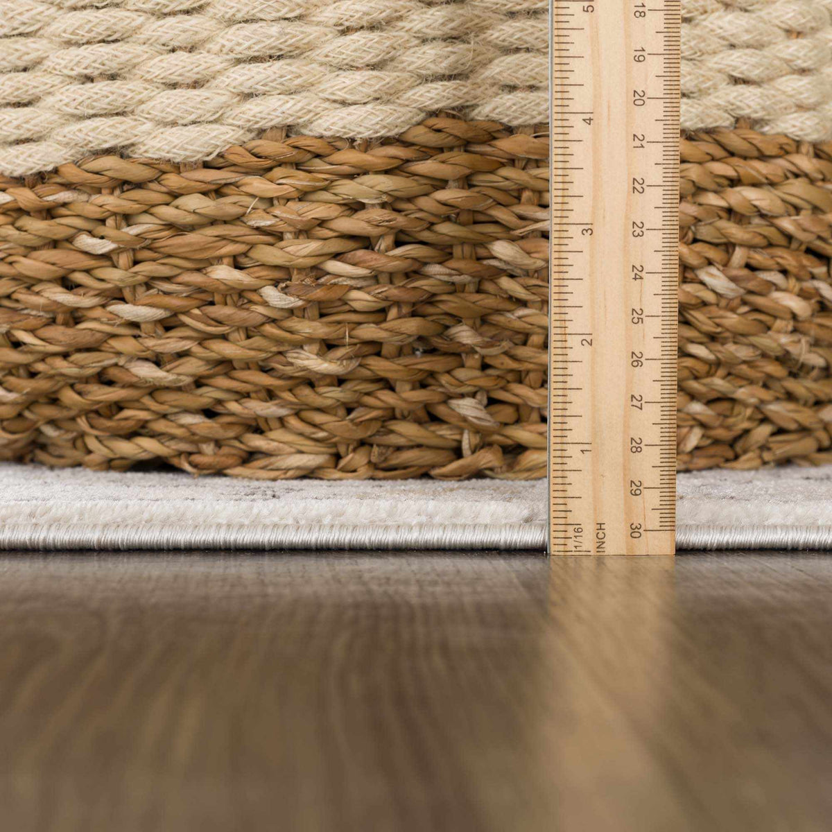 Parkerfield Area Rug by Boutique Rugs, natural beige braided jute with a thick border on Tampa Home & Garden Store