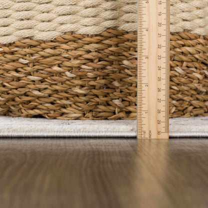 Parkerfield Area Rug by Boutique Rugs, natural beige braided jute with a thick border on Tampa Home & Garden Store