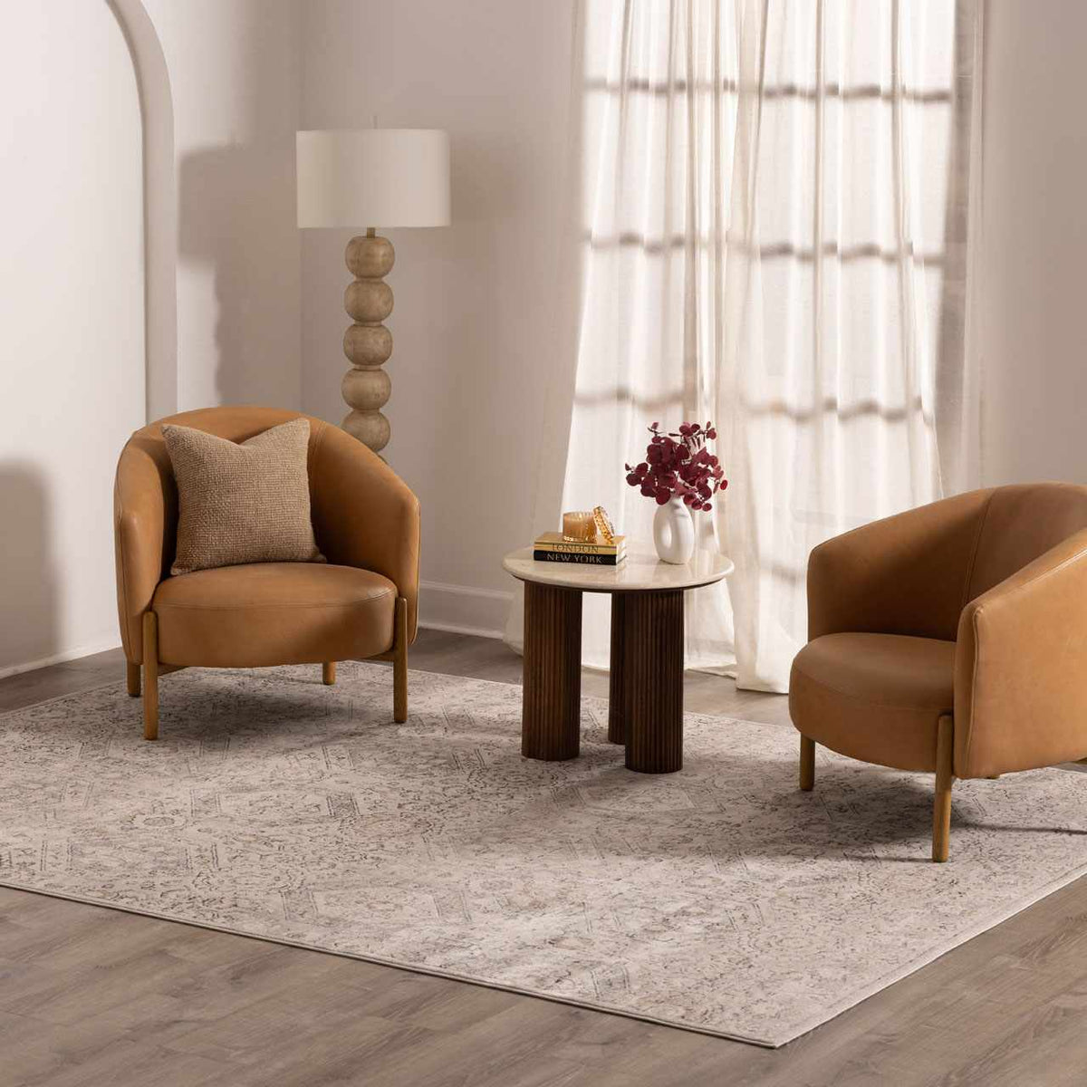 Parkerfield Area Rug beige-gray with subtle pattern two tan lounge chairs Boutique Rugs on Tampa Home & Garden Store