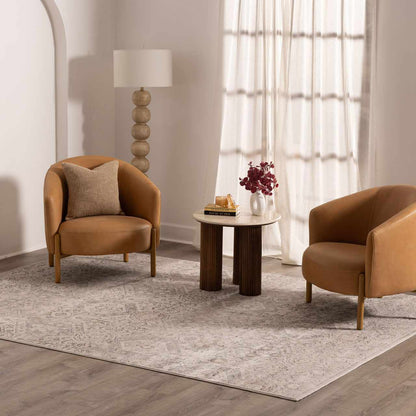 Parkerfield Area Rug beige-gray with subtle pattern two tan lounge chairs Boutique Rugs on Tampa Home & Garden Store