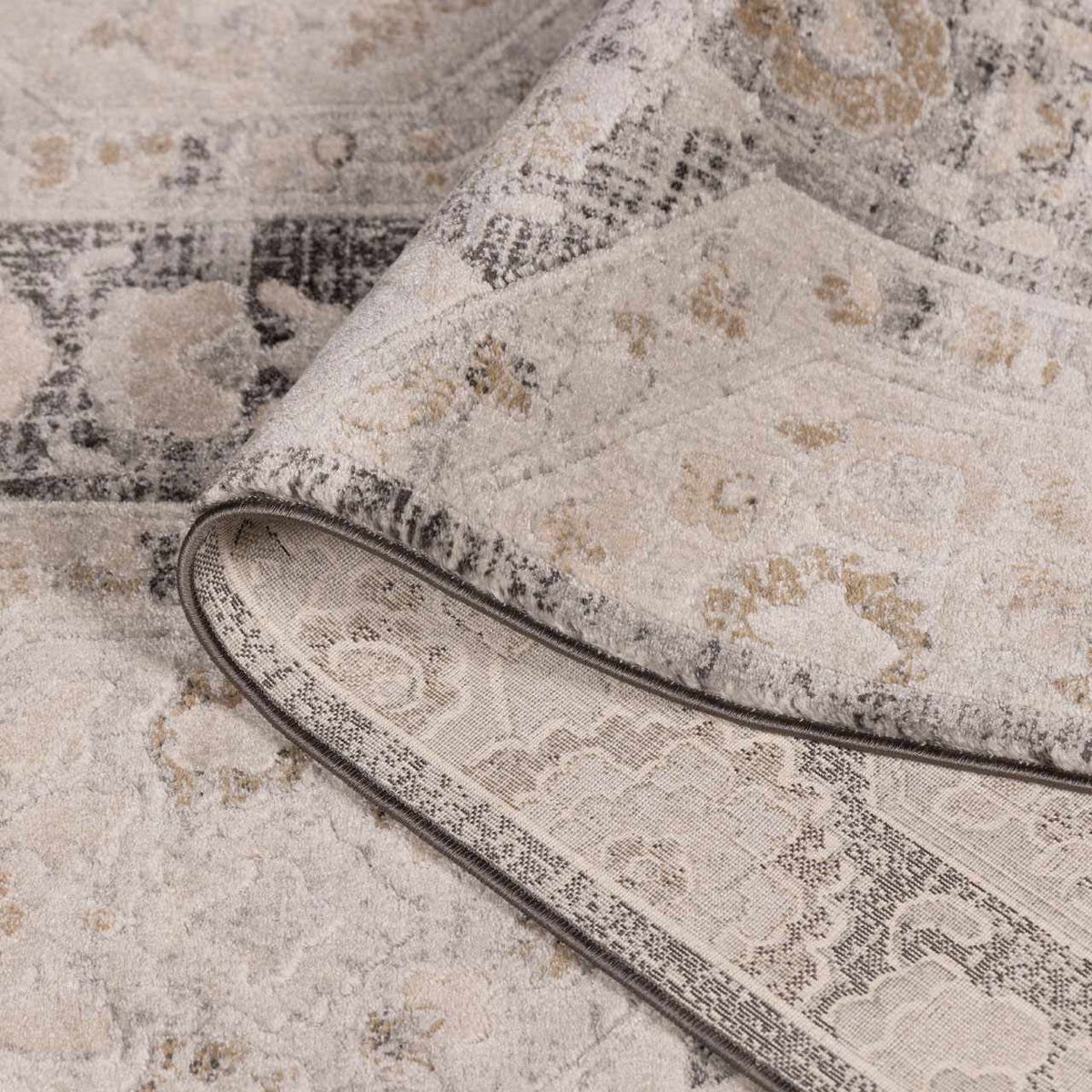 Minoa Area Rug by Boutique Rugs, beige and gray distressed oriental pattern rug on Tampa Home & Garden Store