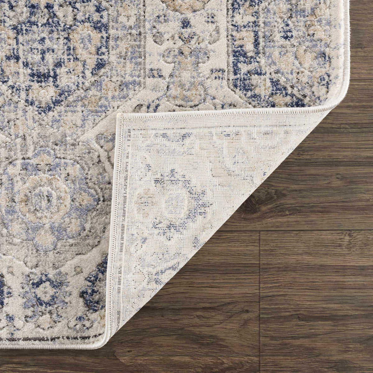 Parkerfield Cream & Blue Area Rug by Boutique Rugs, cream and blue vintage-pattern area rug on Tampa Home & Garden Store