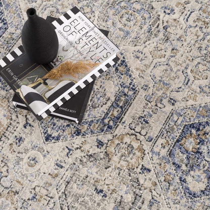Parkerfield cream and blue area rug by Boutique Rugs with soft textured vintage pattern on Tampa Home & Garden Store