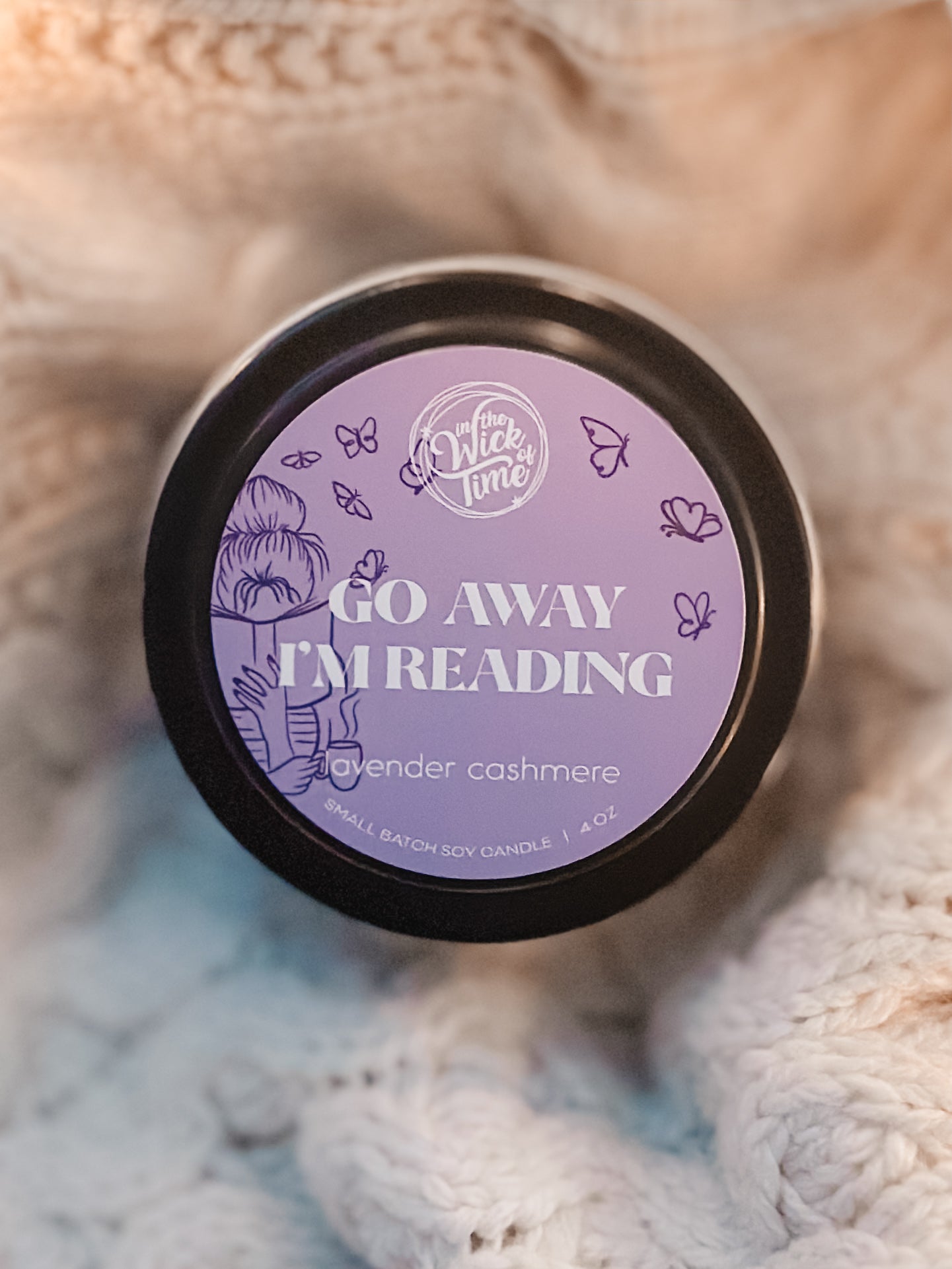 Go Away I'm Reading Candle 4 oz lavender cashmere by In the Wick of Time in a black tin on Tampa Home & Garden Store