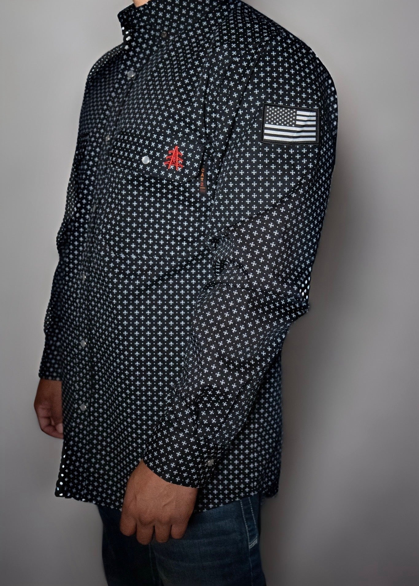 Static FR Pearl Snap Work Shirt Reaper Black with U.S. flag patch on sleeve, dark navy fabric with small white pattern on Tampa Home & Garden Store