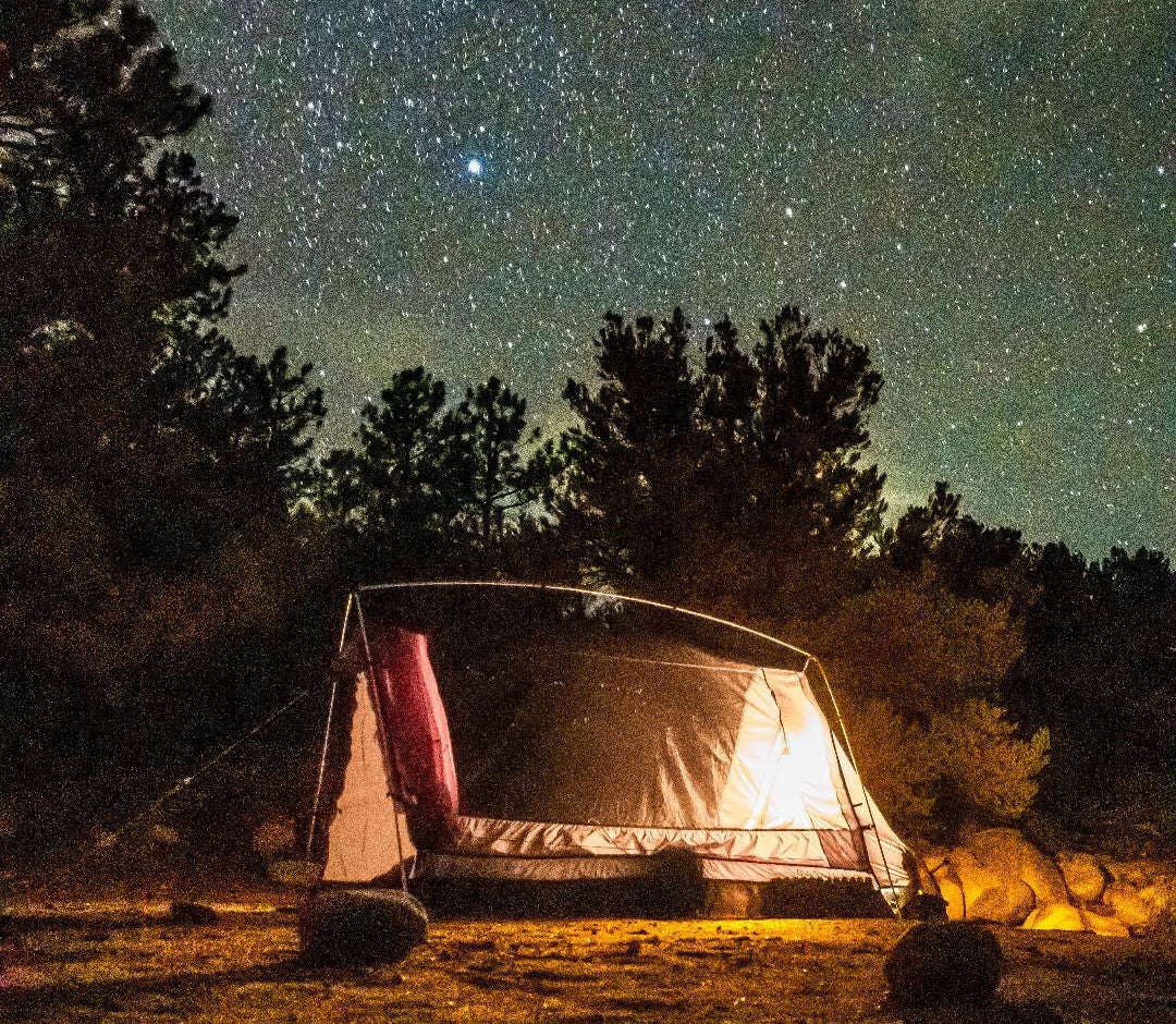 Sky View Solo Tent by Sky View Tents warm-lit camping shelter under a starry night sky on Tampa Home & Garden Store