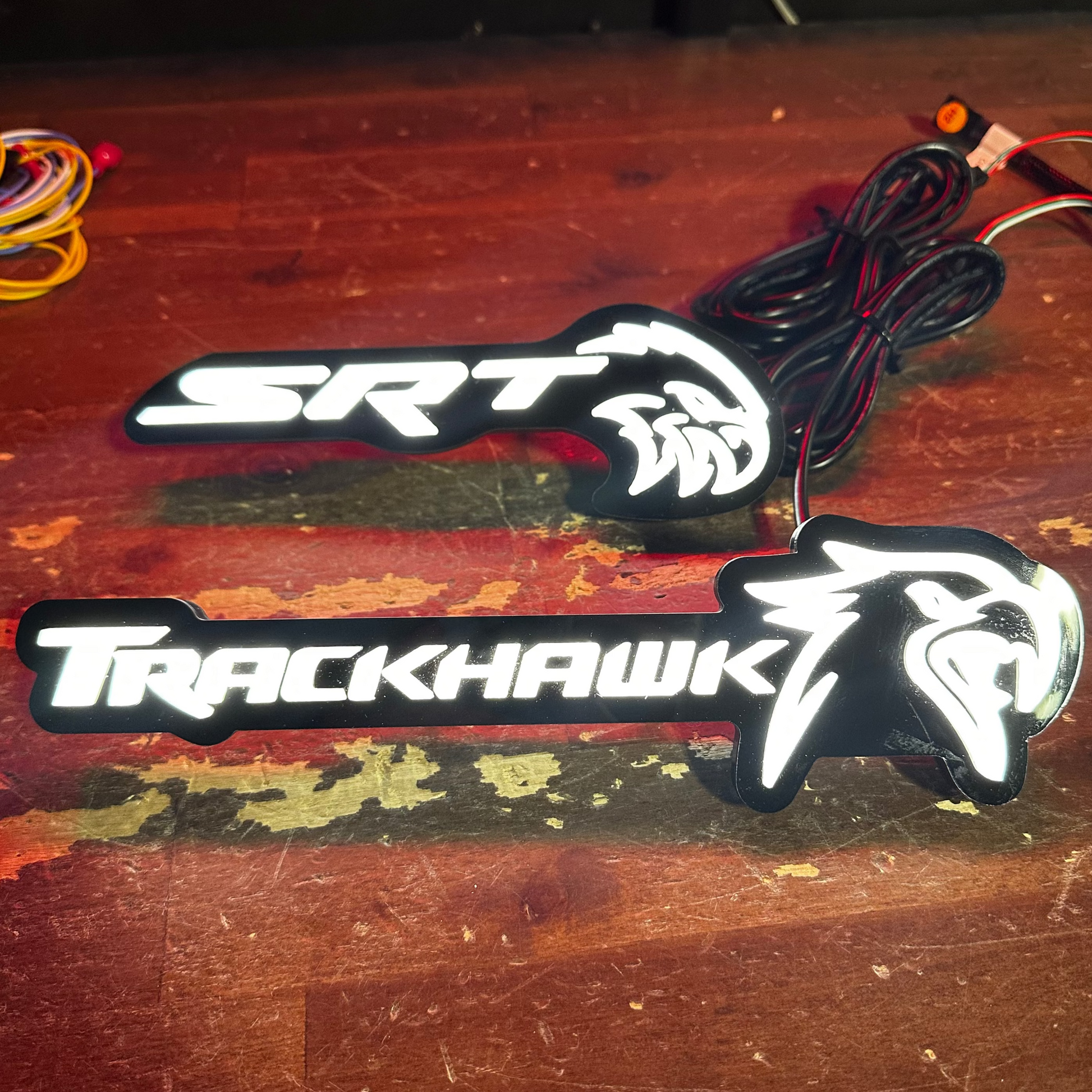 Jeep Trackhawk RGBW Flow Series LED emblem, black housing, white LED lettering AutoLEDTech on Tampa Home & Garden Store