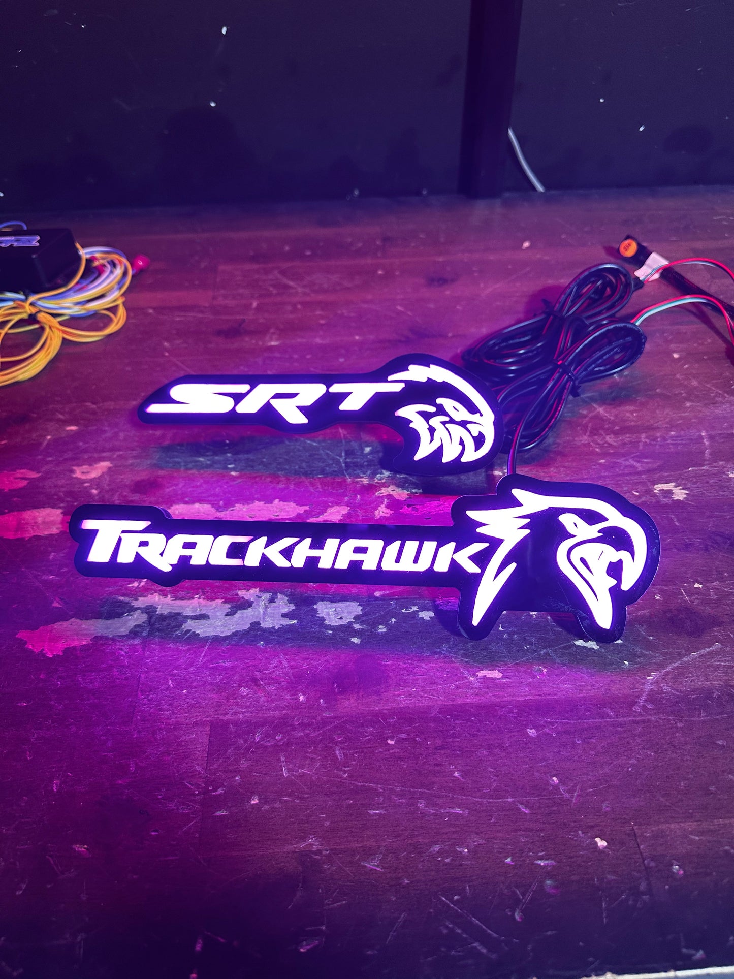 Jeep Trackhawk Flow grill emblem set with SRT and Trackhawk logos, white light with purple glow on Tampa Home & Garden Store