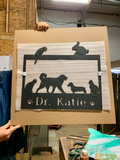 Custom metal pet sign with cat and dog silhouettes, personalized name Dr. Katie on Tampa Home & Garden Store