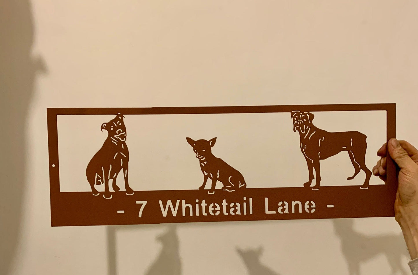 Custom metal pet sign featuring brown dog and cat silhouettes with address 7 Whitetail Lane on Tampa Home & Garden Store