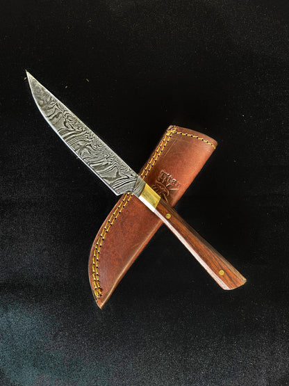 Damascus steel steak knife with patterned blade and brass bolster leather sheath on Tampa Home & Garden Store