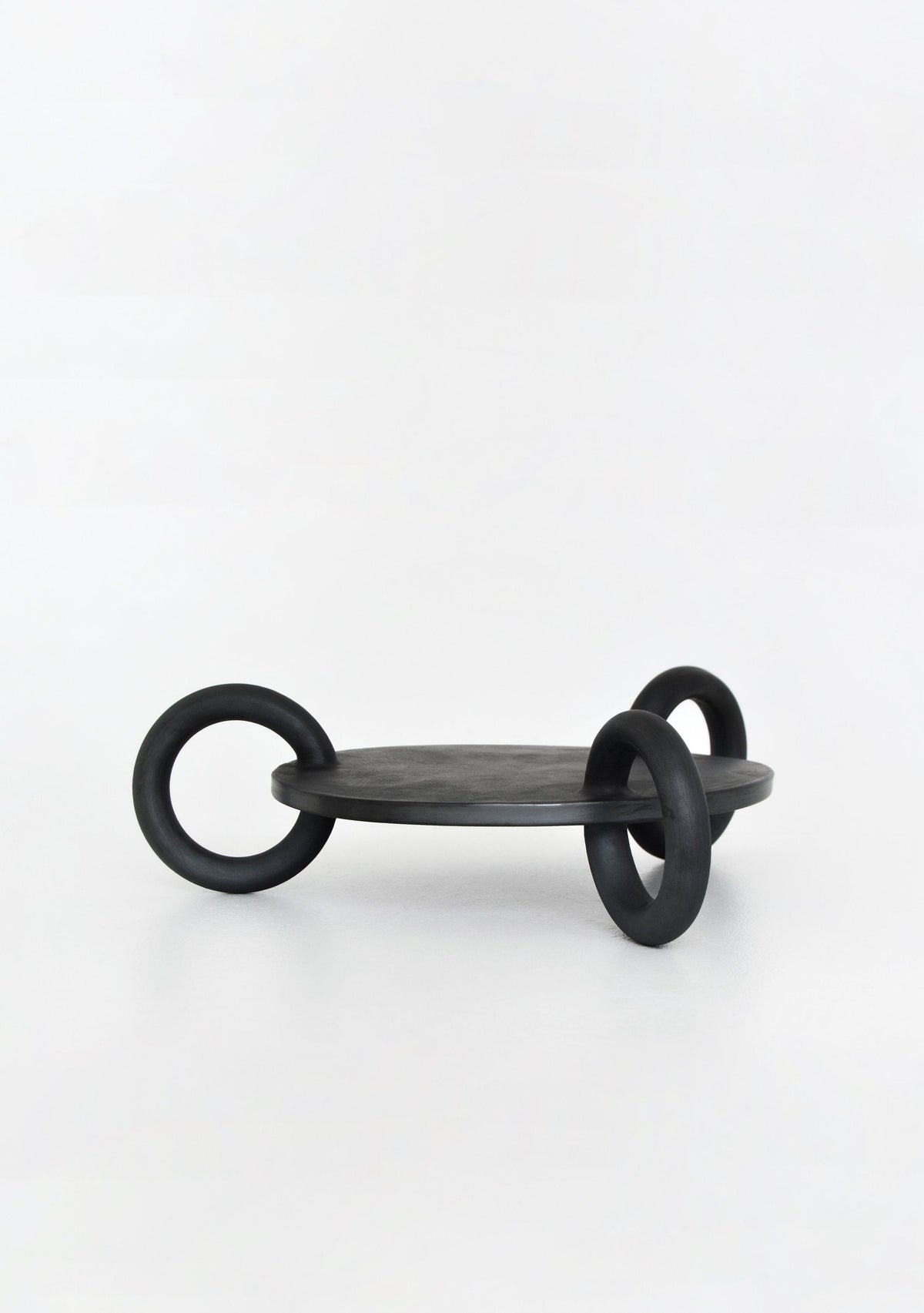 Large black metal serving platter Guculiya Trinity by Creating Comfort with ring-leg stand on Tampa Home & Garden Store