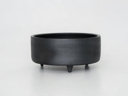 Tall serving bowl with lid Guculia Shadow in matte black ceramic on three feet on Tampa Home & Garden Store