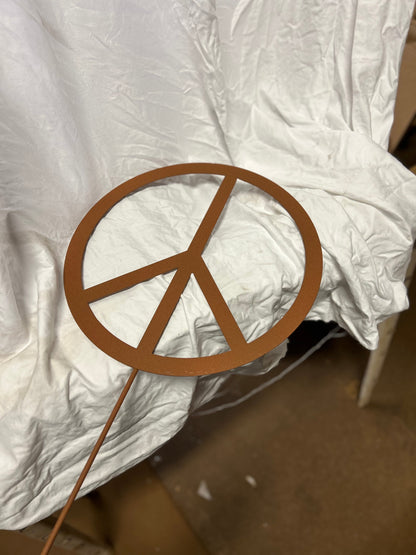 Peace sign metal lawn ornament rust-colored finish on stake by Rustica Ornamentals on Tampa Home & Garden Store