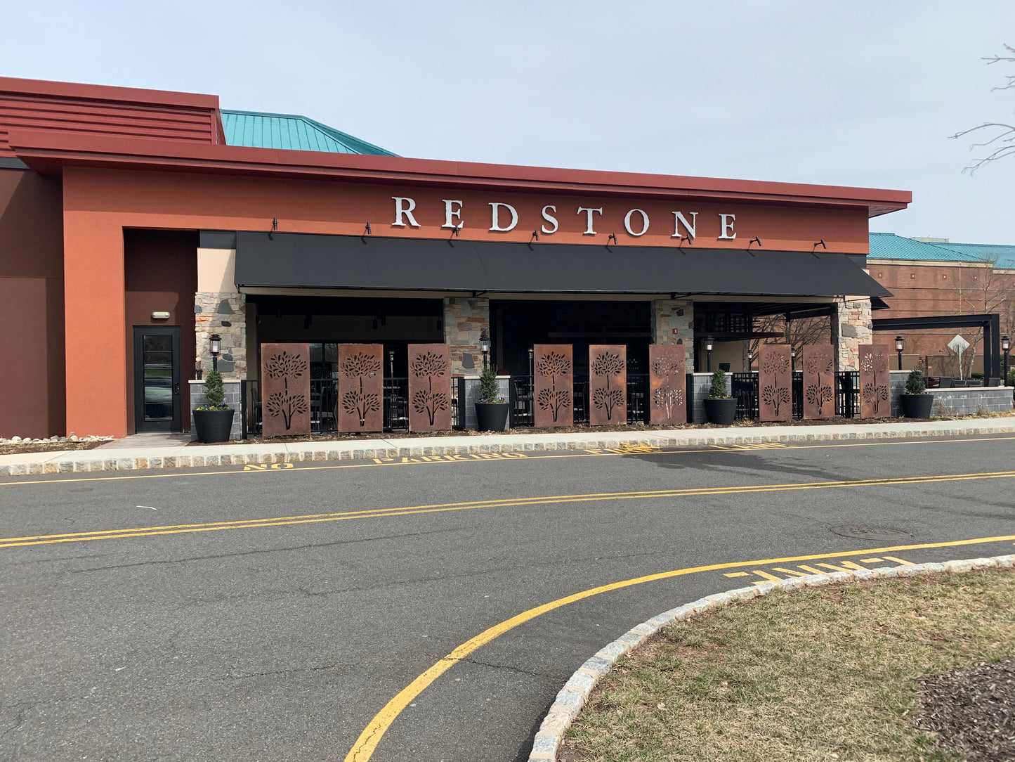 Rustica Ornamentals outdoor privacy screens with tree-cutout panels in rust metal 46 inch on Tampa Home & Garden Store