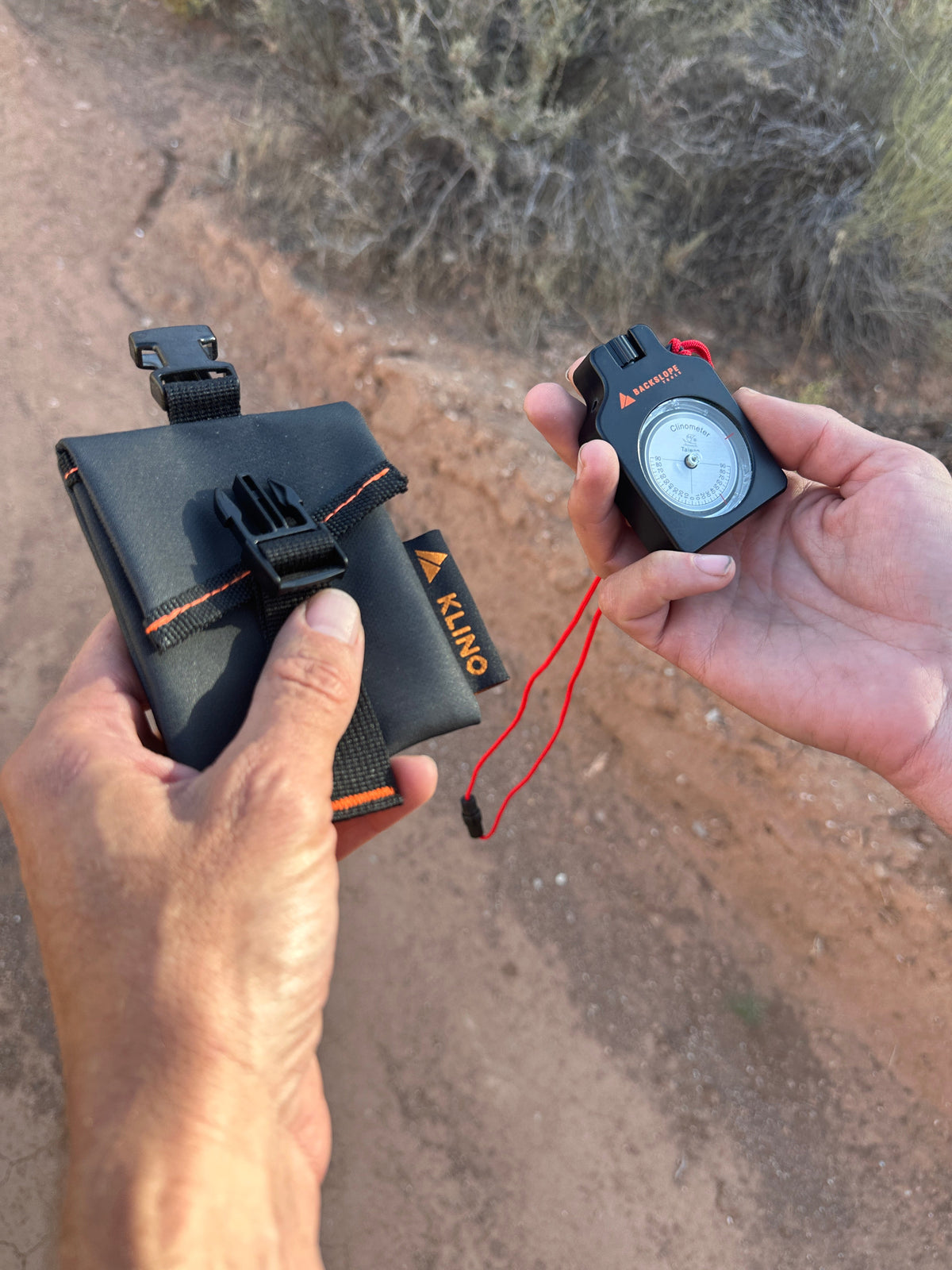 Klino Kover tool pouch and Backslope clinometer on a dirt trail on Tampa Home & Garden Store
