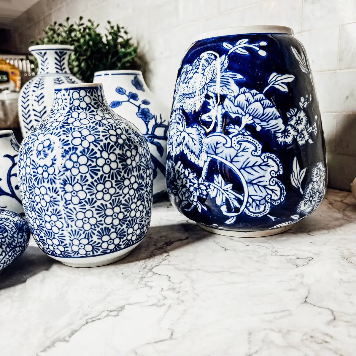Samira blue porcelain vases with white floral patterns, Gia Roma ceramic set of multiple vases on Tampa Home & Garden Store