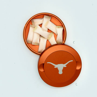 Texas Longhorns metal nicotine pouch cans orange tin with white longhorn logo on Tampa Home & Garden Store